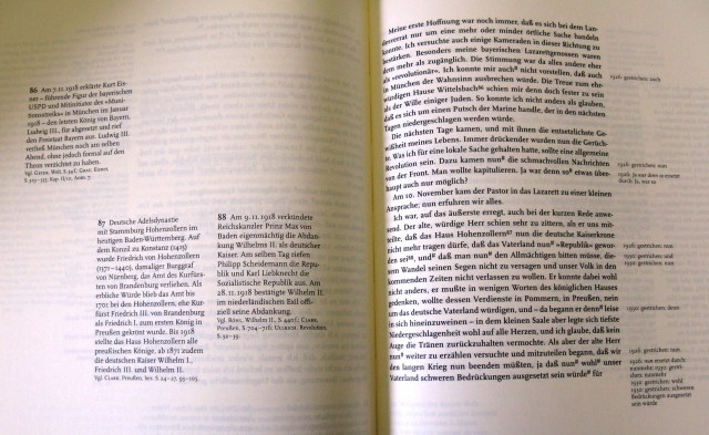 Pages of the critical edition showing text on the right-hand page with dated revisions and annotations on the left-hand page