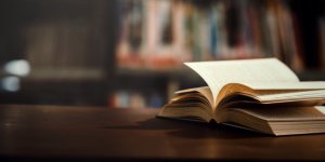 Book in library with open textbook,education learning concept