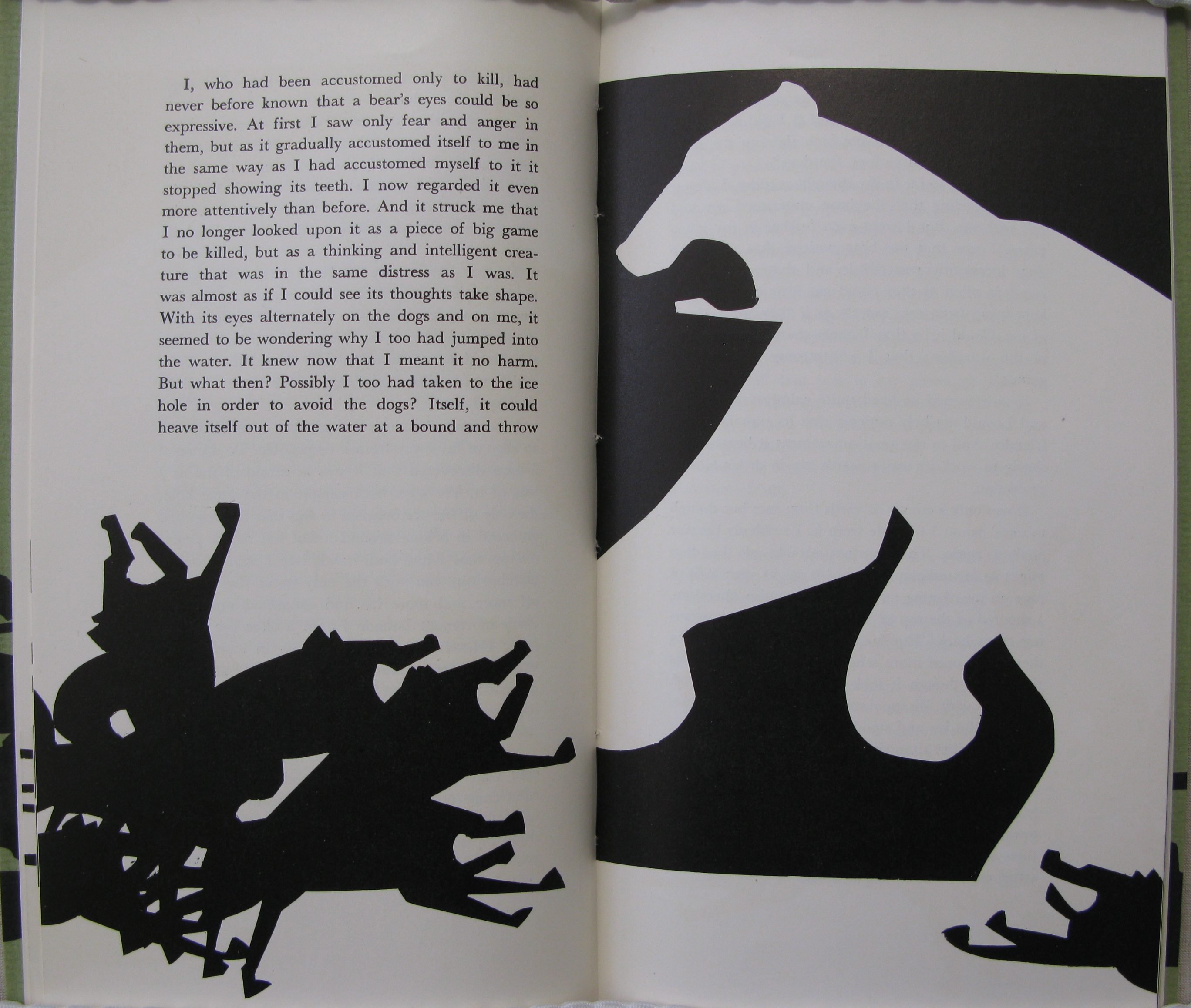 Double page from The bear in the ice hole, with an illustration of a bear fighting wolves